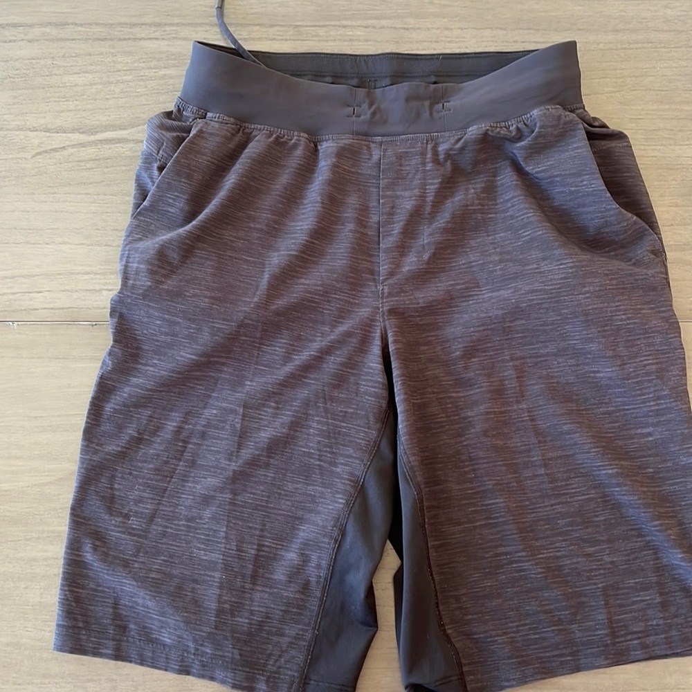 Black Lululemon size small men’s athletic shorts not lined excellent condition